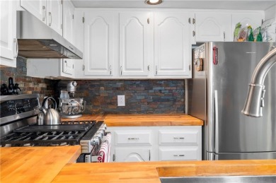 Nestled within the picturesque Louisquisset Golf Course on Louisquisset Golf Club in Rhode Island - for sale on GolfHomes.com, golf home, golf lot