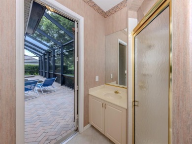 Stunning residence that's filled with natural light and on The Venice Golf and Country Club in Florida - for sale on GolfHomes.com, golf home, golf lot
