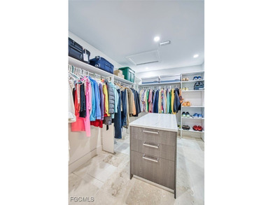 Sweeping water views will greet you when you walk into this on The Dunes Golf and Tennis Club in Florida - for sale on GolfHomes.com, golf home, golf lot