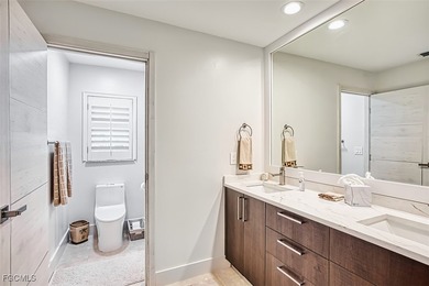 Sweeping water views will greet you when you walk into this on The Dunes Golf and Tennis Club in Florida - for sale on GolfHomes.com, golf home, golf lot