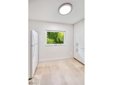 Sweeping water views will greet you when you walk into this on The Dunes Golf and Tennis Club in Florida - for sale on GolfHomes.com, golf home, golf lot