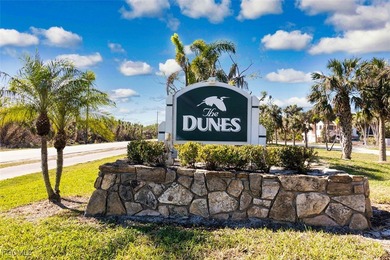 Sweeping water views will greet you when you walk into this on The Dunes Golf and Tennis Club in Florida - for sale on GolfHomes.com, golf home, golf lot
