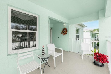 MOVE RIGHT IN to this IMMACULATE second floor unit, with a on Sabal Trace Golf and Country Club in Florida - for sale on GolfHomes.com, golf home, golf lot