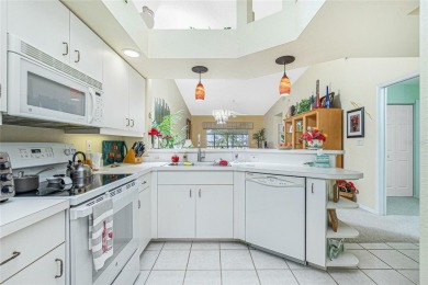 MOVE RIGHT IN to this IMMACULATE second floor unit, with a on Sabal Trace Golf and Country Club in Florida - for sale on GolfHomes.com, golf home, golf lot
