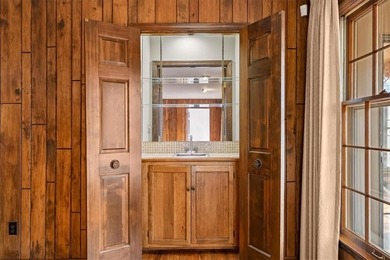 Nestled along the 16th hole at the Country Club of Leawood, this on Leawood South Country Club in Kansas - for sale on GolfHomes.com, golf home, golf lot