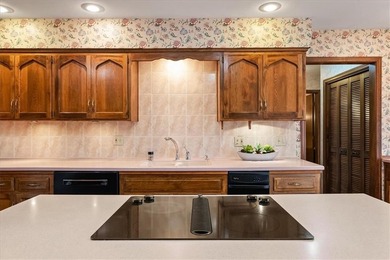 Nestled along the 16th hole at the Country Club of Leawood, this on Leawood South Country Club in Kansas - for sale on GolfHomes.com, golf home, golf lot