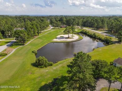 Welcome home to 7212 Windward Drive inside of the immaculate on Harbour Point Golf Club in North Carolina - for sale on GolfHomes.com, golf home, golf lot