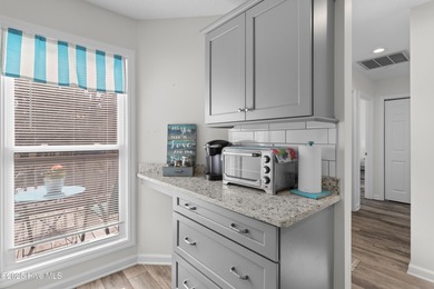 Welcome home to 7212 Windward Drive inside of the immaculate on Harbour Point Golf Club in North Carolina - for sale on GolfHomes.com, golf home, golf lot