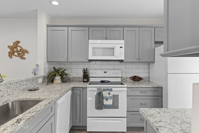 Welcome home to 7212 Windward Drive inside of the immaculate on Harbour Point Golf Club in North Carolina - for sale on GolfHomes.com, golf home, golf lot