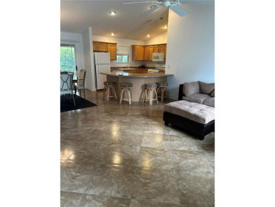 This 2-bedroom, 2-bath Austin Model home is located in the on Glenview Championship Golf and Country Club in Florida - for sale on GolfHomes.com, golf home, golf lot