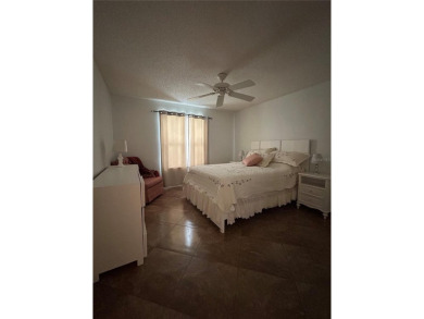 This 2-bedroom, 2-bath Austin Model home is located in the on Glenview Championship Golf and Country Club in Florida - for sale on GolfHomes.com, golf home, golf lot