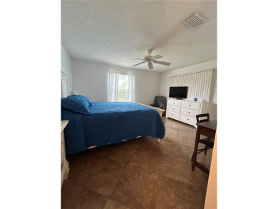 This 2-bedroom, 2-bath Austin Model home is located in the on Glenview Championship Golf and Country Club in Florida - for sale on GolfHomes.com, golf home, golf lot