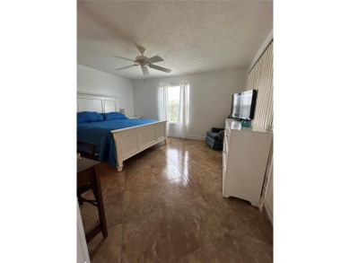 This 2-bedroom, 2-bath Austin Model home is located in the on Glenview Championship Golf and Country Club in Florida - for sale on GolfHomes.com, golf home, golf lot