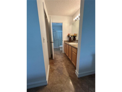 This 2-bedroom, 2-bath Austin Model home is located in the on Glenview Championship Golf and Country Club in Florida - for sale on GolfHomes.com, golf home, golf lot