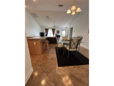 This 2-bedroom, 2-bath Austin Model home is located in the on Glenview Championship Golf and Country Club in Florida - for sale on GolfHomes.com, golf home, golf lot