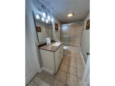 The 2 bed/2bath home with lake view is just what you are looking on The Oaks Golf Course in Missouri - for sale on GolfHomes.com, golf home, golf lot