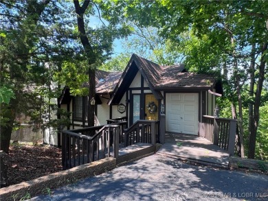 The 2 bed/2bath home with lake view is just what you are looking on The Oaks Golf Course in Missouri - for sale on GolfHomes.com, golf home, golf lot