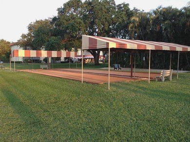 Centrally located close to shopping, highways, restaurants on Hollybrook Golf and Tennis Club  in Florida - for sale on GolfHomes.com, golf home, golf lot