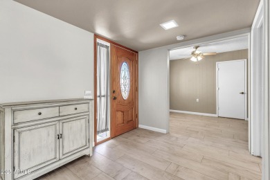 Welcome to this beautifully maintained townhouse nestled in the on Leisure World Country Club in Arizona - for sale on GolfHomes.com, golf home, golf lot