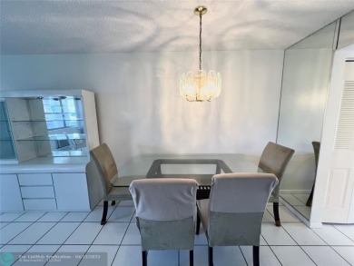 ENJOY THE CONVENIENCE OF FIRST FLOOR LIVING IN THIS ONE BEDROOM on Hillsboro Pines Golf in Florida - for sale on GolfHomes.com, golf home, golf lot