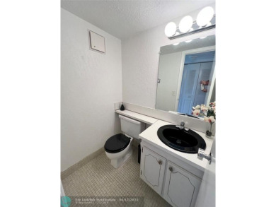 ENJOY THE CONVENIENCE OF FIRST FLOOR LIVING IN THIS ONE BEDROOM on Hillsboro Pines Golf in Florida - for sale on GolfHomes.com, golf home, golf lot