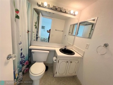 ENJOY THE CONVENIENCE OF FIRST FLOOR LIVING IN THIS ONE BEDROOM on Hillsboro Pines Golf in Florida - for sale on GolfHomes.com, golf home, golf lot