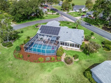 Saltwater Pool Paradise | 3 Beds o 2 Baths | Corner Lot | Fully on The Links of Spruce Creek in Florida - for sale on GolfHomes.com, golf home, golf lot