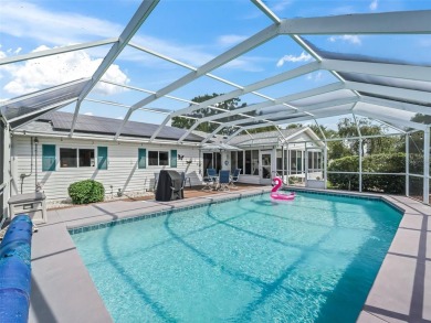 Saltwater Pool Paradise | 3 Beds o 2 Baths | Corner Lot | Fully on The Links of Spruce Creek in Florida - for sale on GolfHomes.com, golf home, golf lot