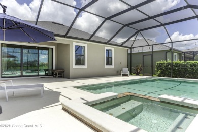 Enjoy lake views and vibrant sunsets from your gas-heated pool on Duran Golf Course in Florida - for sale on GolfHomes.com, golf home, golf lot