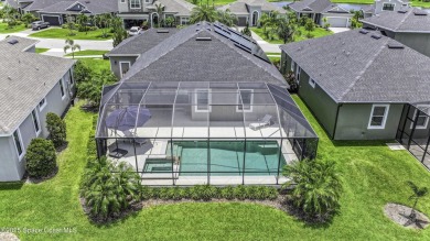 Enjoy lake views and vibrant sunsets from your gas-heated pool on Duran Golf Course in Florida - for sale on GolfHomes.com, golf home, golf lot