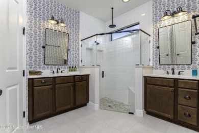 Enjoy lake views and vibrant sunsets from your gas-heated pool on Duran Golf Course in Florida - for sale on GolfHomes.com, golf home, golf lot