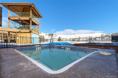 This unique studio condo, with an adjacent lock-off hotel room on Headwaters Golf Course At Granby Ranch in Colorado - for sale on GolfHomes.com, golf home, golf lot