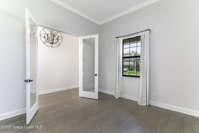 Enjoy lake views and vibrant sunsets from your gas-heated pool on Duran Golf Course in Florida - for sale on GolfHomes.com, golf home, golf lot