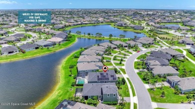 Enjoy lake views and vibrant sunsets from your gas-heated pool on Duran Golf Course in Florida - for sale on GolfHomes.com, golf home, golf lot