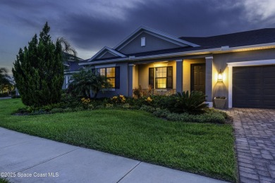 Enjoy lake views and vibrant sunsets from your gas-heated pool on Duran Golf Course in Florida - for sale on GolfHomes.com, golf home, golf lot