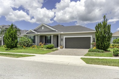 Enjoy lake views and vibrant sunsets from your gas-heated pool on Duran Golf Course in Florida - for sale on GolfHomes.com, golf home, golf lot