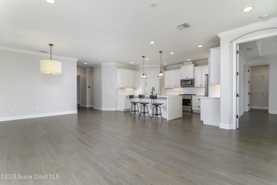Enjoy lake views and vibrant sunsets from your gas-heated pool on Duran Golf Course in Florida - for sale on GolfHomes.com, golf home, golf lot