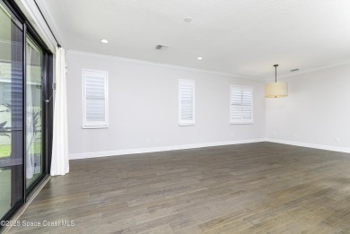 Enjoy lake views and vibrant sunsets from your gas-heated pool on Duran Golf Course in Florida - for sale on GolfHomes.com, golf home, golf lot
