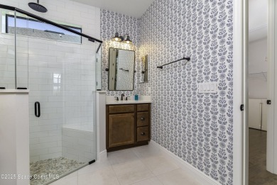 Enjoy lake views and vibrant sunsets from your gas-heated pool on Duran Golf Course in Florida - for sale on GolfHomes.com, golf home, golf lot