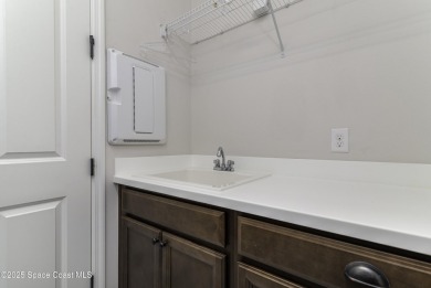 Enjoy lake views and vibrant sunsets from your gas-heated pool on Duran Golf Course in Florida - for sale on GolfHomes.com, golf home, golf lot