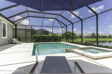 Enjoy lake views and vibrant sunsets from your gas-heated pool on Duran Golf Course in Florida - for sale on GolfHomes.com, golf home, golf lot