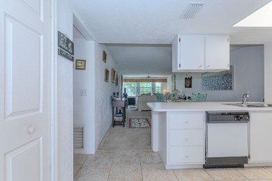 Experience serene living in this beautifully maintained on Village Golf Club in Florida - for sale on GolfHomes.com, golf home, golf lot