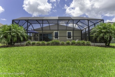 Enjoy lake views and vibrant sunsets from your gas-heated pool on Duran Golf Course in Florida - for sale on GolfHomes.com, golf home, golf lot