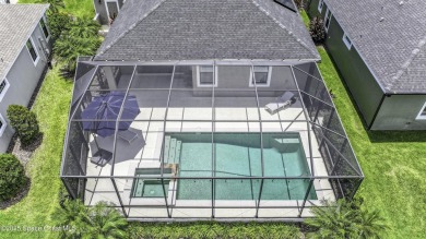 Enjoy lake views and vibrant sunsets from your gas-heated pool on Duran Golf Course in Florida - for sale on GolfHomes.com, golf home, golf lot