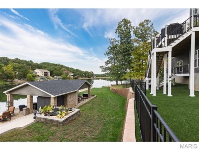 Not only will you get this spectacular home, but the lot next on Raintree Country Club in Missouri - for sale on GolfHomes.com, golf home, golf lot
