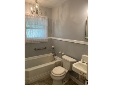 This charming two bedroom, one bath cottage is close to schools on Scott Schriener Municipal Golf Course in Texas - for sale on GolfHomes.com, golf home, golf lot