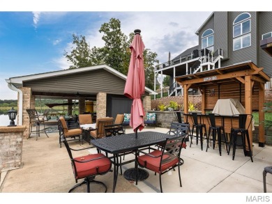 Not only will you get this spectacular home, but the lot next on Raintree Country Club in Missouri - for sale on GolfHomes.com, golf home, golf lot