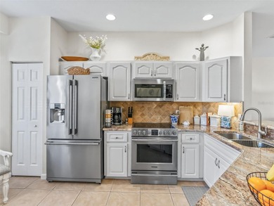 Fabulous Golf Course home with a GOLF CART GARAGE! Welcome to on Ocala Palms Golf and Country Club in Florida - for sale on GolfHomes.com, golf home, golf lot