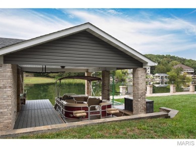 Not only will you get this spectacular home, but the lot next on Raintree Country Club in Missouri - for sale on GolfHomes.com, golf home, golf lot