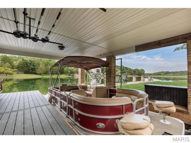 Not only will you get this spectacular home, but the lot next on Raintree Country Club in Missouri - for sale on GolfHomes.com, golf home, golf lot
